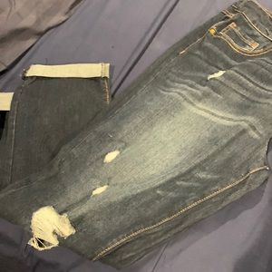 Ladies dark wash distressed jeans